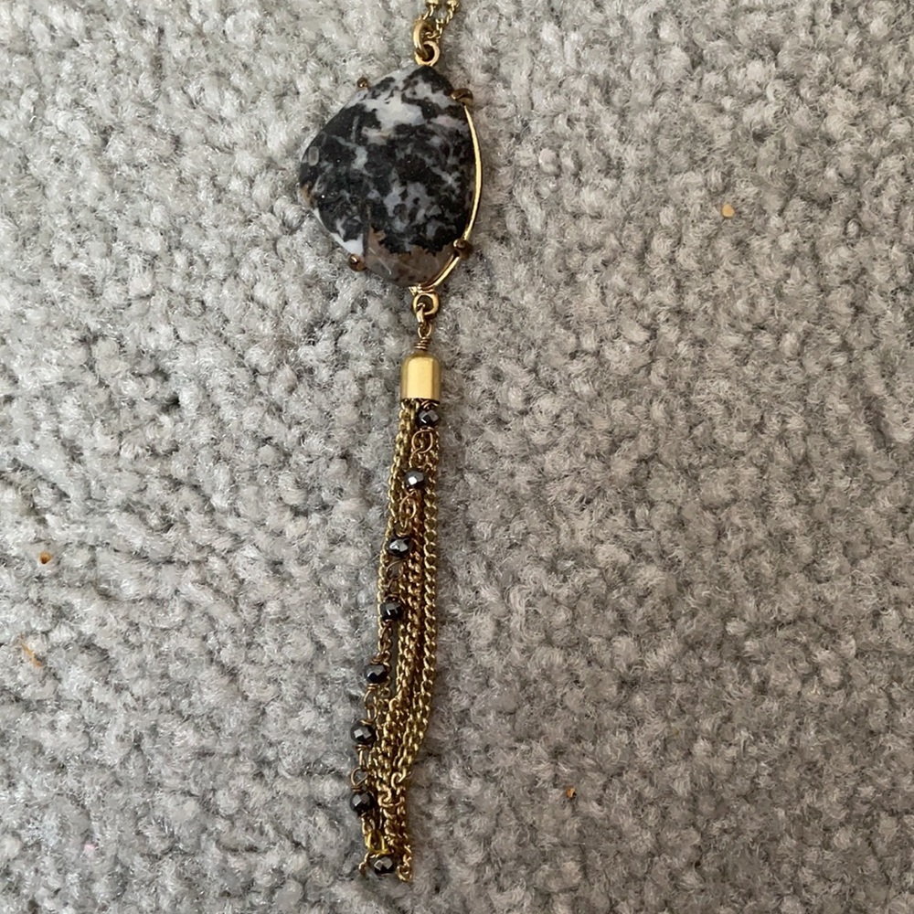 Long necklace with black and white stone